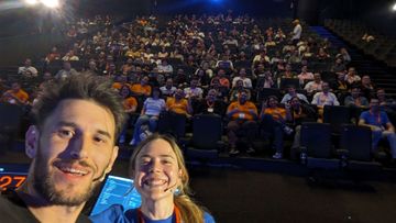 Selfie from the stage in the foreground I appear with the master of ceremonies Alba and the antendees in the background